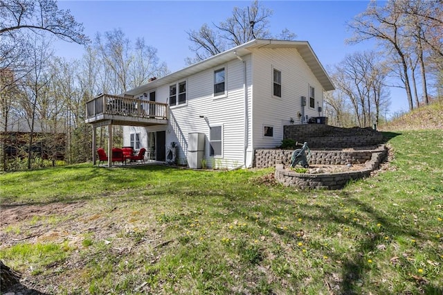 1141 134th Ave, Amery, WI 54001 - back of property featuring a yard, a deck, and a patio