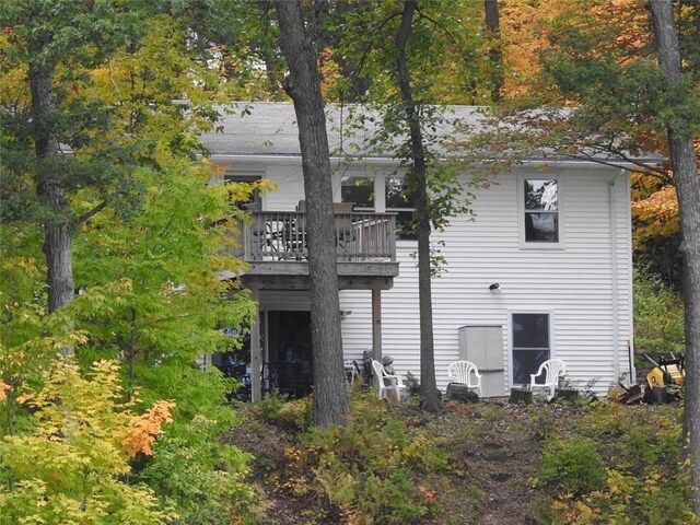 1141 134th Ave, Amery, WI 54001 - rear view of house with a balcony