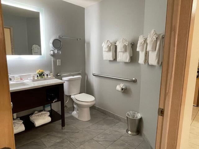 123 Center St Unit 101, Lake Geneva, WI 53147 - bathroom with toilet and vanity