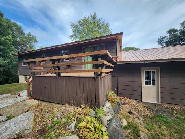 1451 90th Ave, Amery, WI 54001 - rear view of property with metal roof and a wooden deck