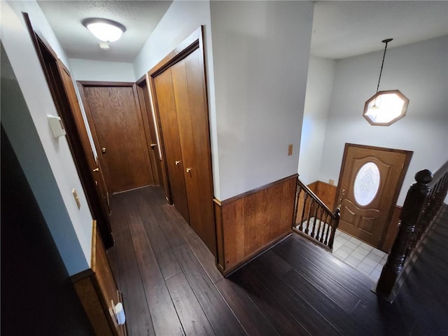 1451 90th Ave, Amery, WI 54001 - entrance foyer featuring dark wood-style flooring and wainscoting