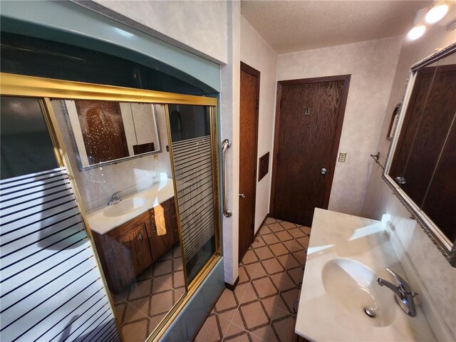 1451 90th Ave, Amery, WI 54001 - bathroom with a stall shower, vanity, and tile patterned flooring
