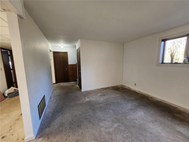 1451 90th Ave, Amery, WI 54001 - spare room featuring unfinished concrete flooring