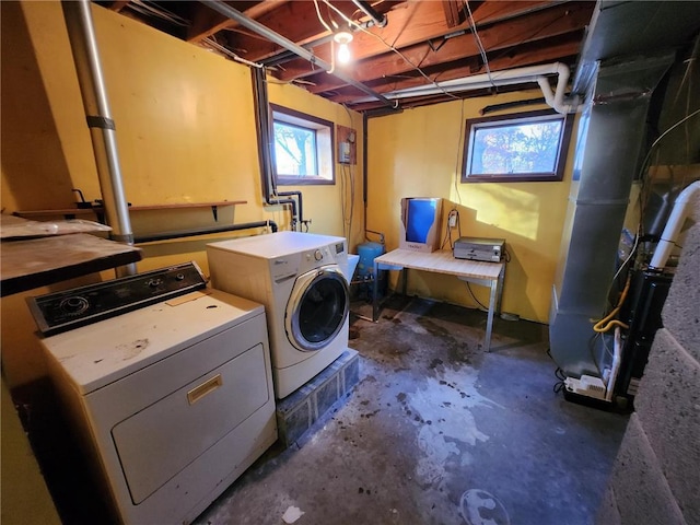 1451 90th Ave, Amery, WI 54001 - laundry room featuring washing machine and dryer and heating unit