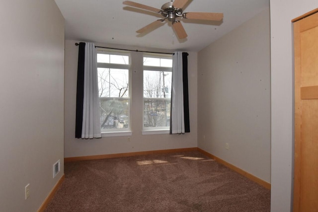 110 S Wisconsin St Unit 2E, Port Washington, WI 53074 - carpeted empty room featuring baseboards and ceiling fan