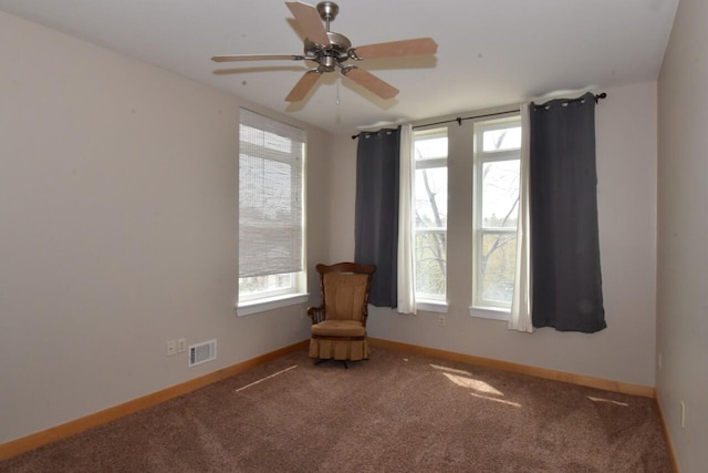 110 S Wisconsin St Unit 2E, Port Washington, WI 53074 - unfurnished room featuring carpet floors, baseboards, and ceiling fan