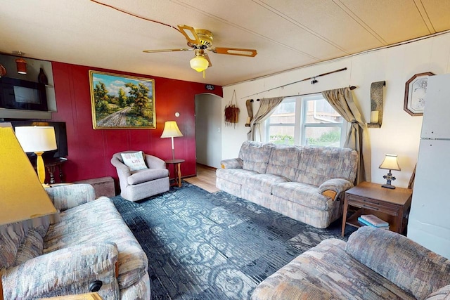 21701 259th St, Delhi, IA 52223 - living room with ceiling fan and wood finished floors