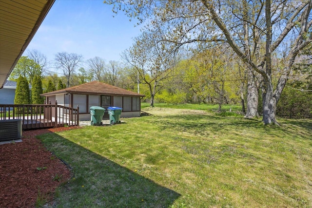 7224 Dartmoor Ave, Greendale, WI 53129 - view of grassy yard with a detached garage and a deck