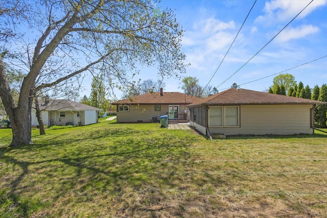 7224 Dartmoor Ave, Greendale, WI 53129 - back of house featuring a yard and a deck