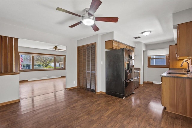 7224 Dartmoor Ave, Greendale, WI 53129 - kitchen featuring freestanding refrigerator, a sink, ceiling fan, and dark wood-type flooring
