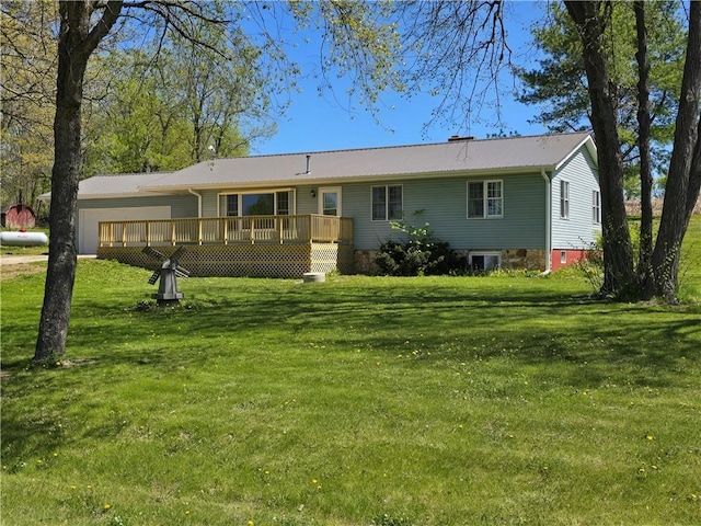 N760 Sandberg Rd, Melrose, WI 54642 - view of front of property featuring a wooden deck, a garage, a front lawn, and metal roof