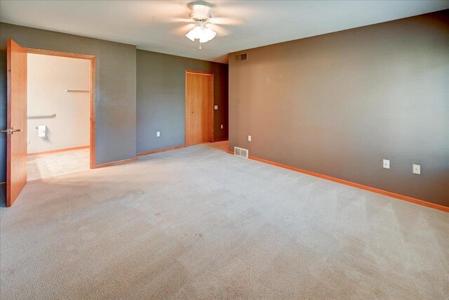 7910 N Brookline Dr, Madison, WI 53719 - empty room featuring a ceiling fan, baseboards, and carpet