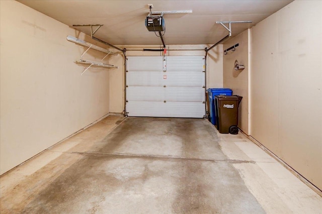 7910 N Brookline Dr, Madison, WI 53719 - garage featuring a garage door opener