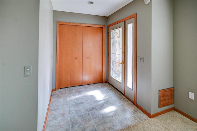 7910 N Brookline Dr, Madison, WI 53719 - entryway featuring baseboards