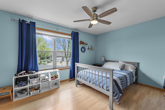 575 Fargo Trl, Middleton, WI 53562 - bedroom featuring wood finished floors, baseboards, and ceiling fan