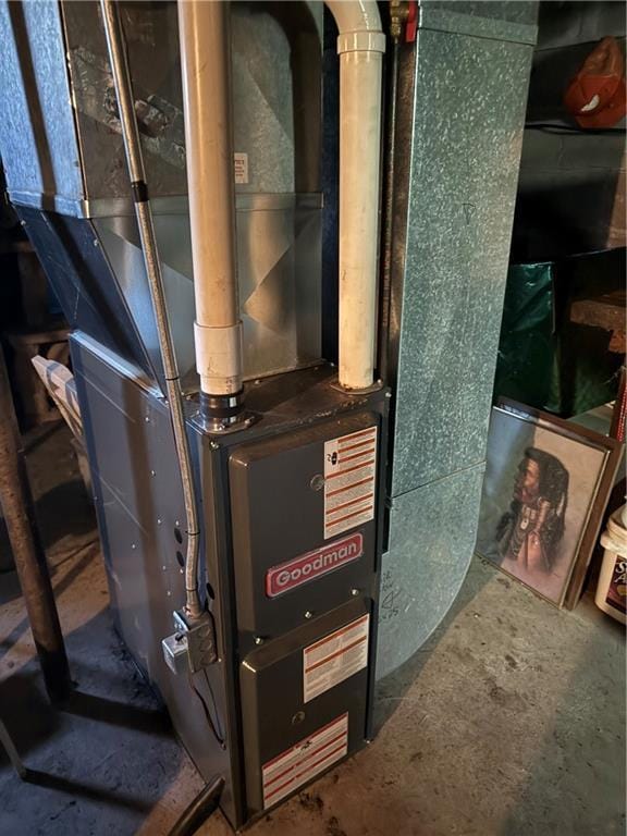 utility room with heating unit