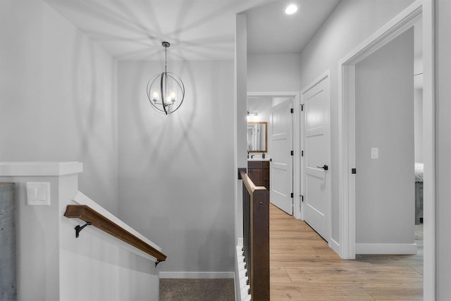2149 Rosenberg Ln, Sun Prairie, WI 53590 - staircase with baseboards, wood finished floors, a chandelier, and recessed lighting