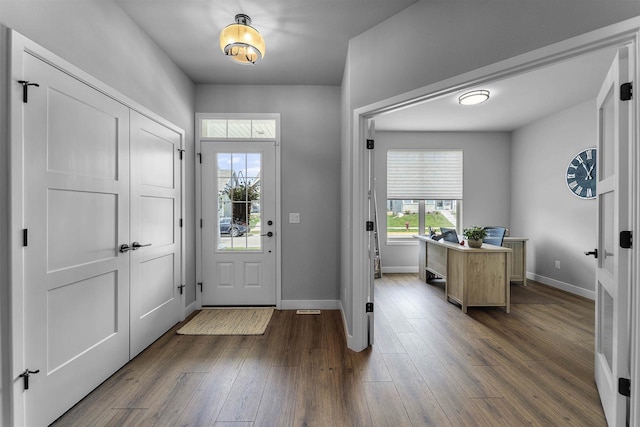 2149 Rosenberg Ln, Sun Prairie, WI 53590 - entrance foyer featuring baseboards and dark wood-style floors