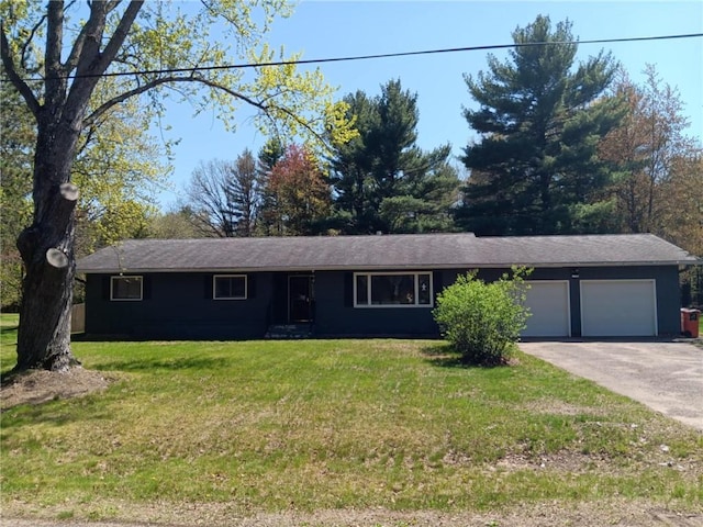 19333 59th Ave, Chippewa Falls, WI 54729 - ranch-style home with an attached garage, asphalt driveway, and a front yard