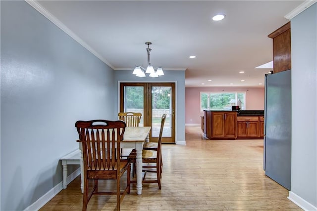 19333 59th Ave, Chippewa Falls, WI 54729 - dining area featuring a chandelier, baseboards, light wood finished floors, ornamental molding, and recessed lighting