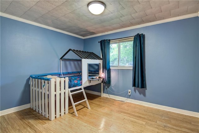 19333 59th Ave, Chippewa Falls, WI 54729 - bedroom featuring crown molding, hardwood / wood-style floors, and baseboards