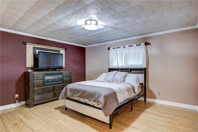 19333 59th Ave, Chippewa Falls, WI 54729 - bedroom featuring light wood finished floors, baseboards, and ornamental molding