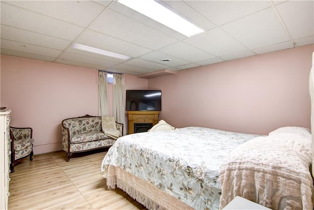 19333 59th Ave, Chippewa Falls, WI 54729 - bedroom with a drop ceiling, wood finished floors, and baseboards