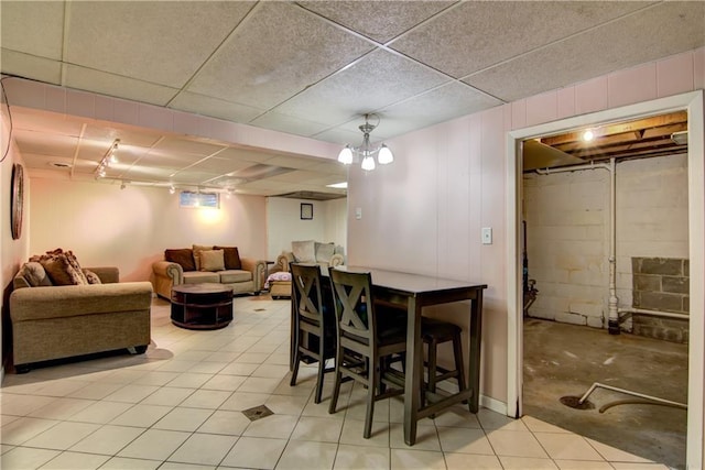 19333 59th Ave, Chippewa Falls, WI 54729 - dining space featuring light tile patterned floors and a paneled ceiling
