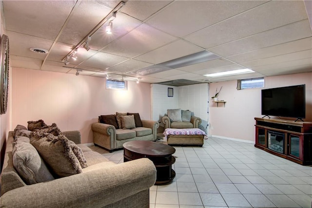 19333 59th Ave, Chippewa Falls, WI 54729 - living room featuring track lighting, baseboards, and tile patterned flooring