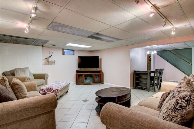 19333 59th Ave, Chippewa Falls, WI 54729 - tiled living room featuring rail lighting and baseboards