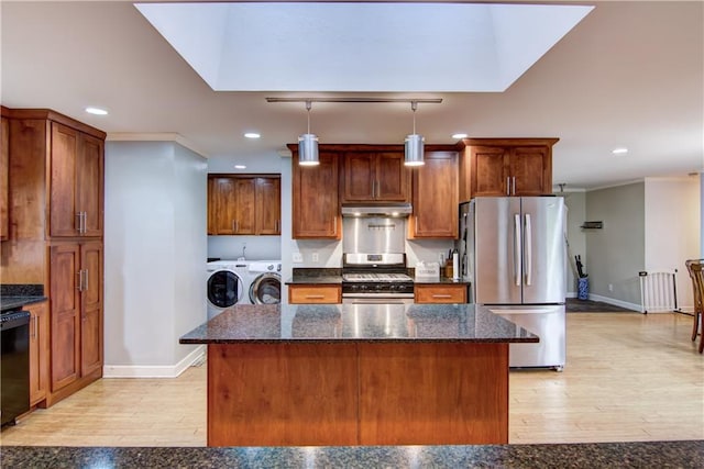 19333 59th Ave, Chippewa Falls, WI 54729 - kitchen with washer and clothes dryer, appliances with stainless steel finishes, baseboards, recessed lighting, and light wood-style floors