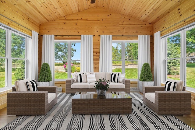 2210 Alban Ln, Prairie Du Sac, WI 53578 - sunroom with vaulted ceiling, wood walls, plenty of natural light, and wooden ceiling