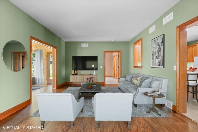 2210 Alban Ln, Prairie Du Sac, WI 53578 - living room with wood finished floors and baseboards