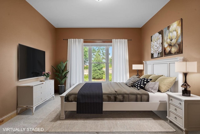 2210 Alban Ln, Prairie Du Sac, WI 53578 - carpeted bedroom featuring baseboards