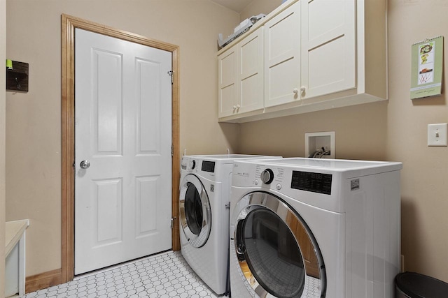 1229 Riverwood Ln, Sobieski, WI 02413 - washroom featuring cabinet space, washer and dryer, and light floors