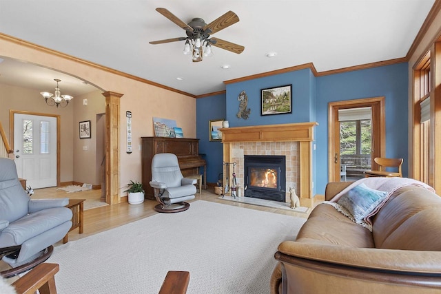 1229 Riverwood Ln, Sobieski, WI 02413 - living room featuring healthy amount of natural light, a ceiling fan, a tile fireplace, baseboards, and recessed lighting