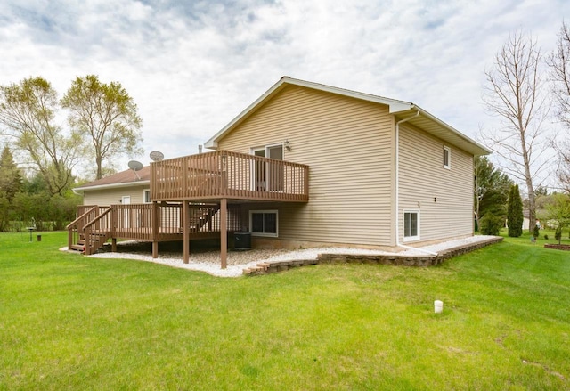 N2664 Grand Path, Wautoma, WI 54982 - rear view of property featuring a wooden deck and a yard