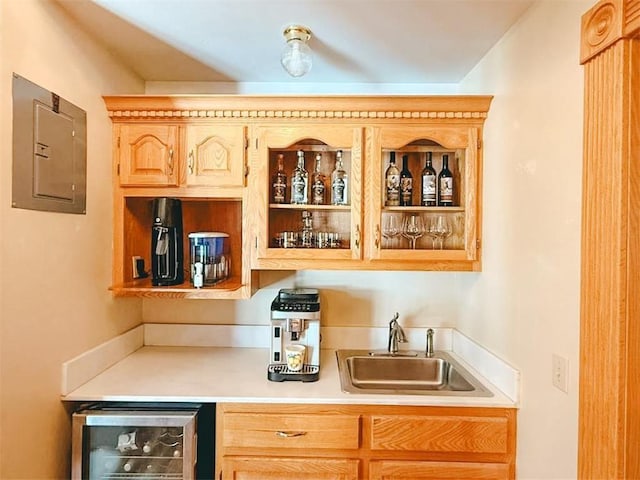 indoor wet bar featuring electric panel and beverage cooler