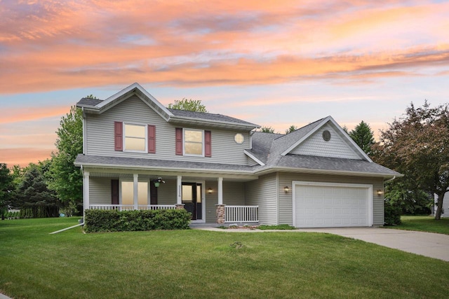 1116 Redwood Ct, Delavan, WI 53115 - view of front of property featuring an attached garage, driveway, covered porch, a yard, and roof with shingles