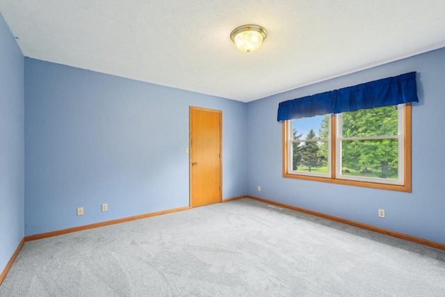 1116 Redwood Ct, Delavan, WI 53115 - empty room with carpet flooring and baseboards