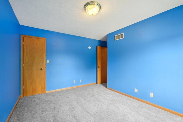 1116 Redwood Ct, Delavan, WI 53115 - carpeted spare room featuring baseboards