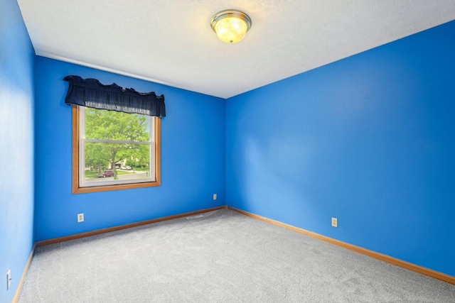 1116 Redwood Ct, Delavan, WI 53115 - carpeted spare room featuring baseboards