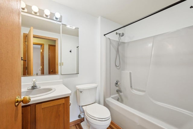 1116 Redwood Ct, Delavan, WI 53115 - bathroom featuring vanity,  shower combination, and toilet