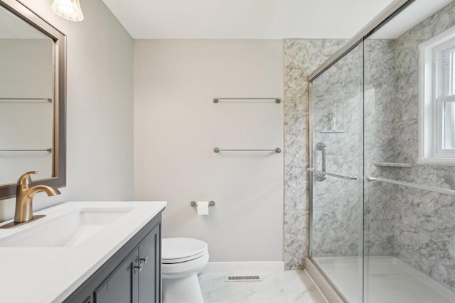 1116 Redwood Ct, Delavan, WI 53115 - full bathroom featuring vanity, toilet, a stall shower, marble look tiles, and baseboards