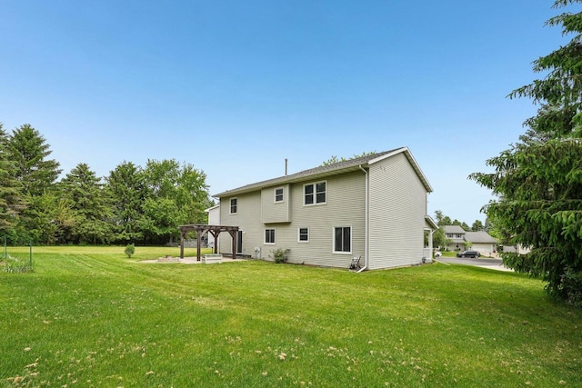 1116 Redwood Ct, Delavan, WI 53115 - back of house with a lawn and a patio area