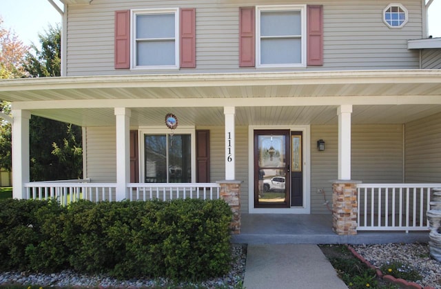 1116 Redwood Ct, Delavan, WI 53115 - entrance to property featuring a porch