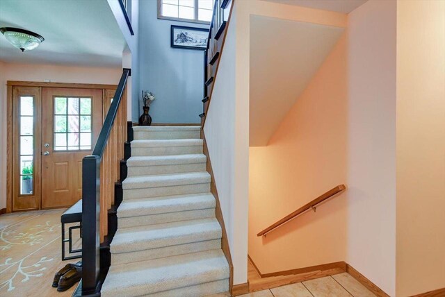 717 Larvik Ln, Stoughton, WI 53589 - stairway with baseboards