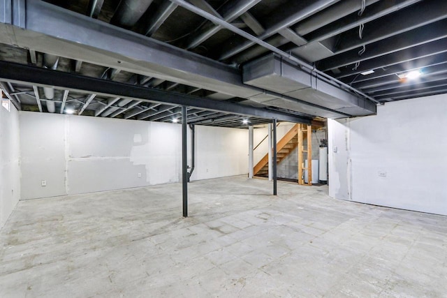 W156N10303 Pilgrim Rd, Germantown, WI 53022 - finished basement featuring stairway and water heater