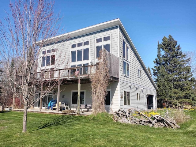 87985 Bark Point Rd, Herbster, WI 54844 - back of house with a yard, a wooden deck, and a patio area
