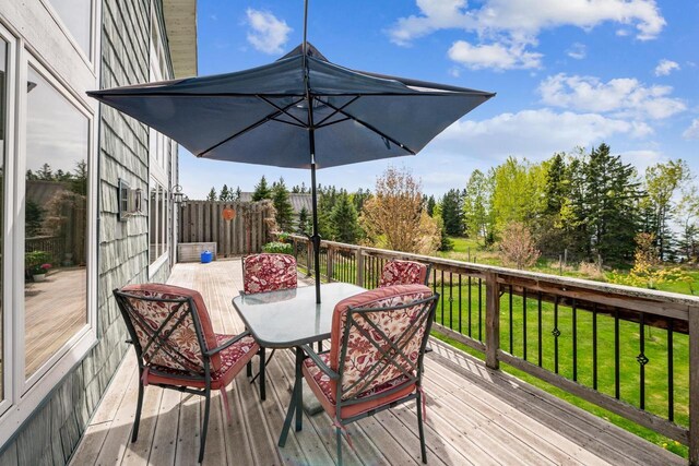 87985 Bark Point Rd, Herbster, WI 54844 - wooden terrace with outdoor dining space and a lawn
